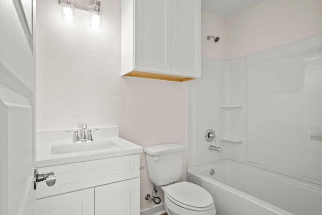 full bathroom featuring vanity, tub / shower combination, and toilet