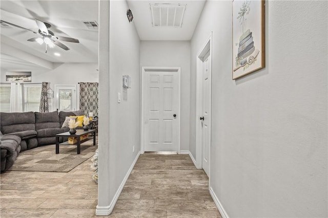 hall with light wood-type flooring