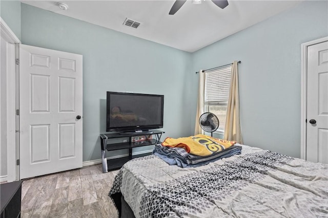 bedroom featuring ceiling fan and light wood-type flooring