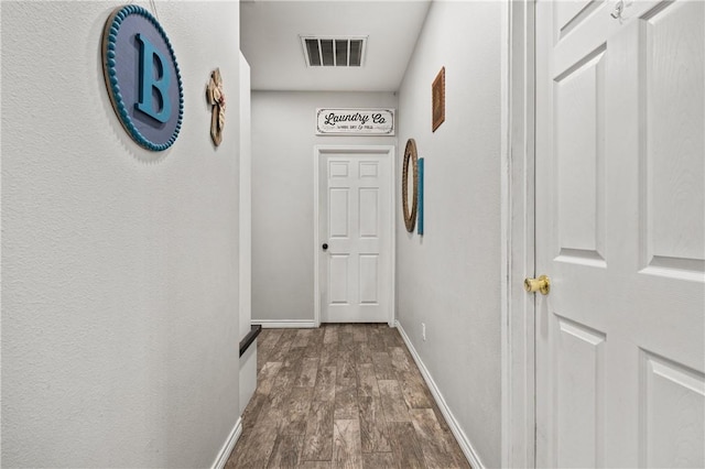 hall featuring wood-type flooring