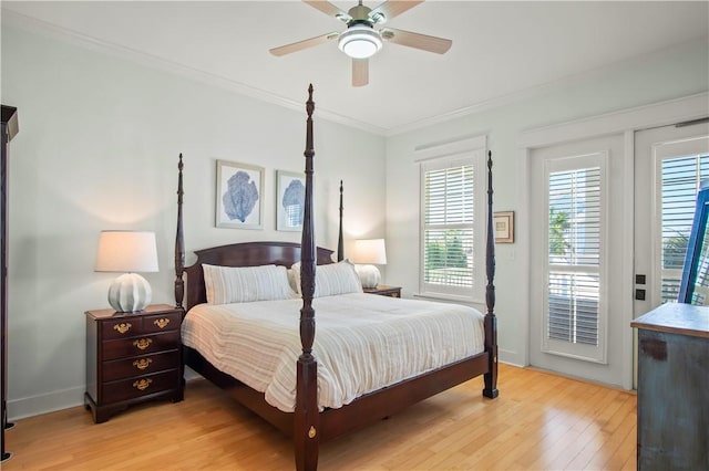 bedroom with crown molding, ceiling fan, and light hardwood / wood-style floors