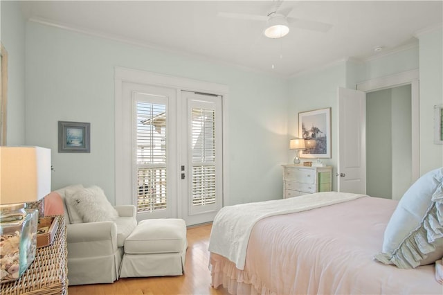 bedroom with ceiling fan, ornamental molding, access to exterior, and light hardwood / wood-style floors