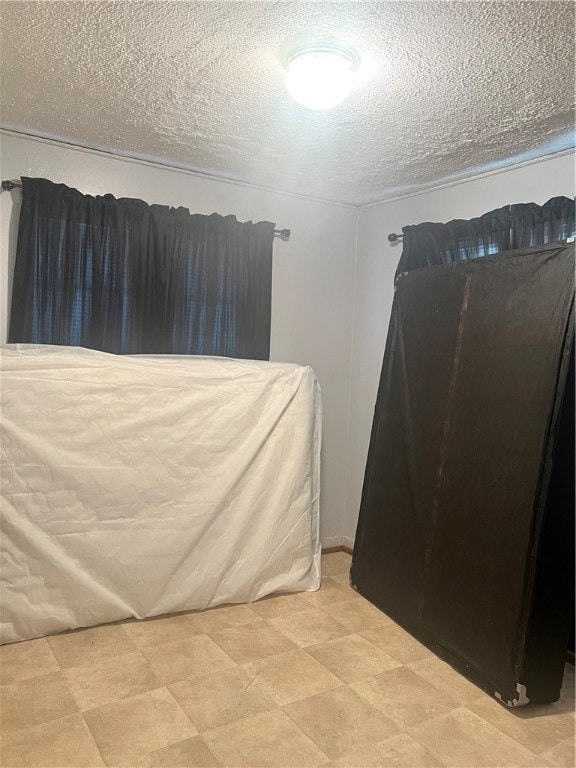 bedroom with a textured ceiling