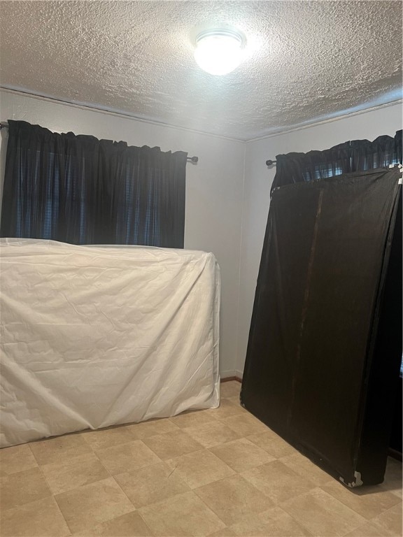 bedroom with a textured ceiling