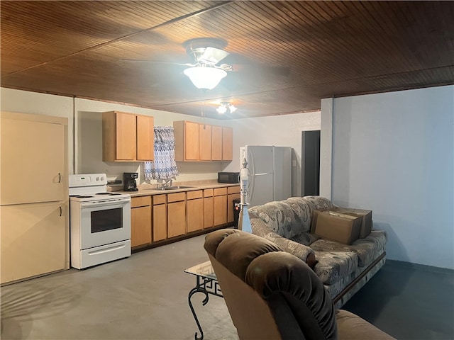 kitchen featuring light brown cabinetry, sink, white appliances, and ceiling fan