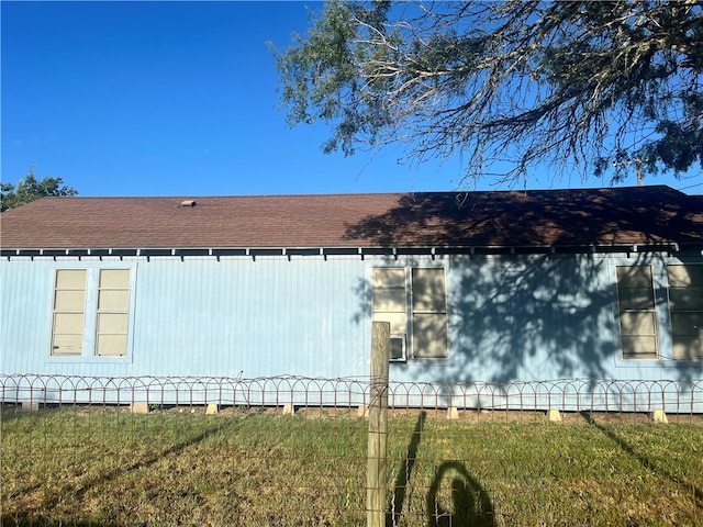 view of home's exterior featuring a yard