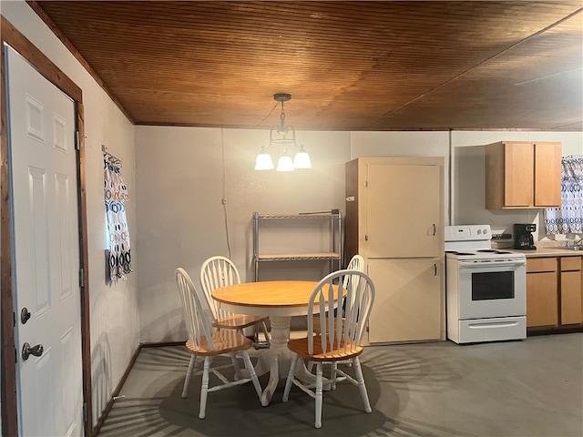 dining space with an inviting chandelier, wood ceiling, and sink