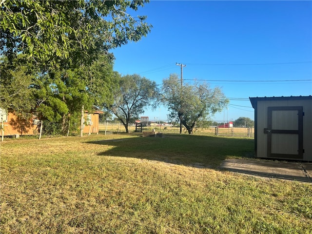 view of yard with a shed