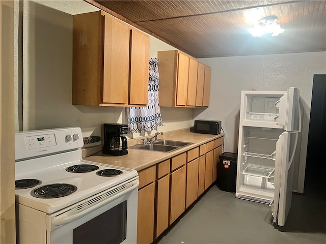 kitchen with white appliances and sink