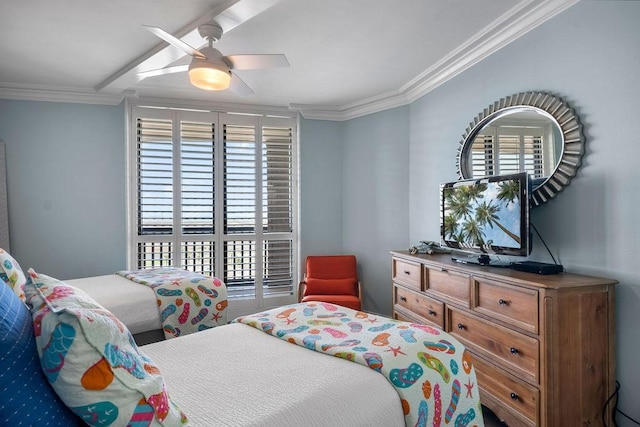 bedroom with ceiling fan, multiple windows, and ornamental molding