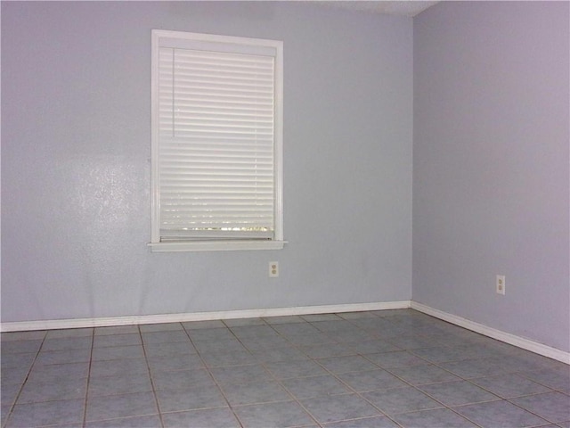 view of tiled empty room