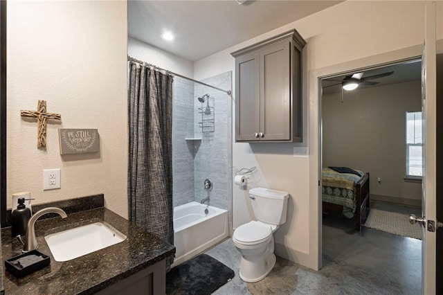 full bathroom featuring vanity, ceiling fan, shower / bath combination with curtain, and toilet