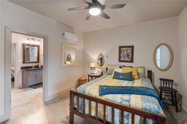 bedroom with ceiling fan, a wall mounted air conditioner, connected bathroom, and sink