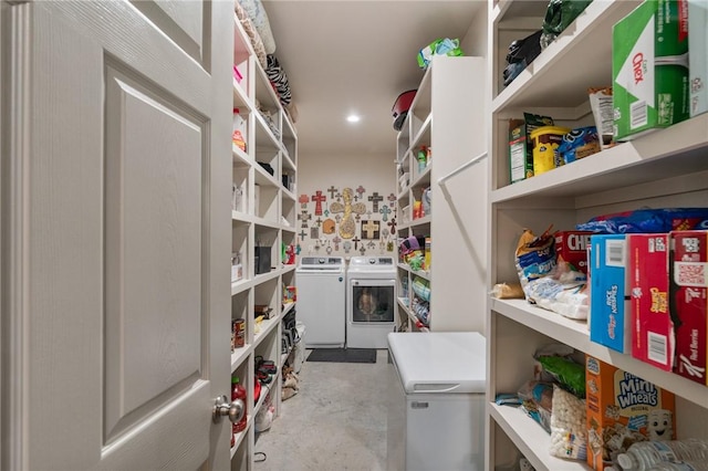 pantry featuring independent washer and dryer