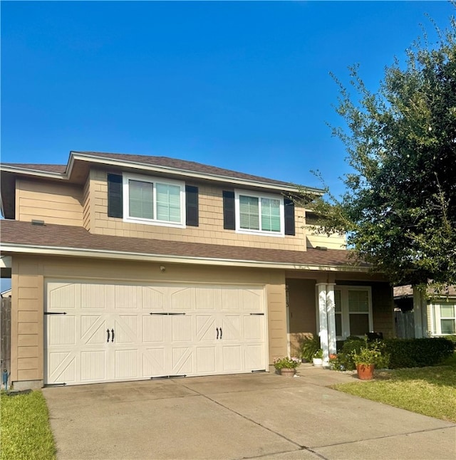 view of front of property with a garage