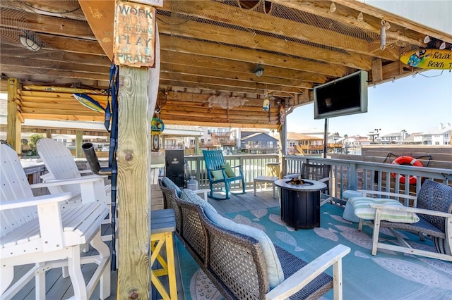 view of patio / terrace with an outdoor fire pit