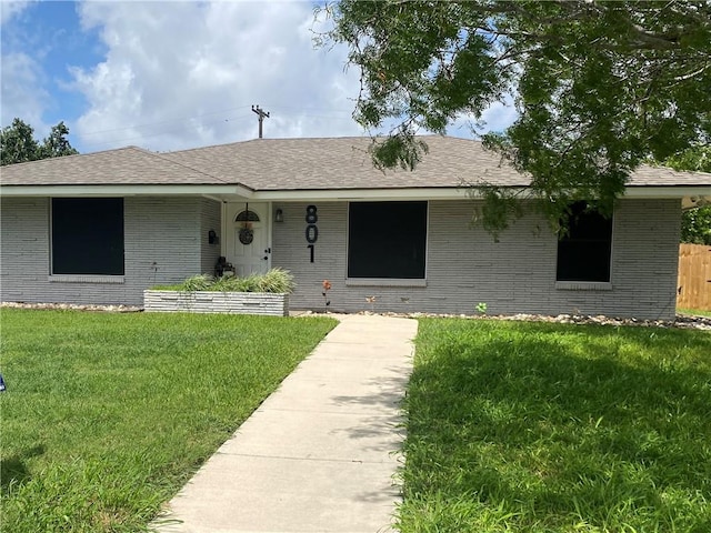 801 Belmeade Dr, Corpus Christi, TX 78412 - ranch-style home featuring a front yard, brick siding, and roof with shingles