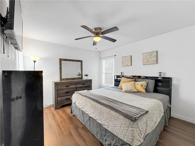 1205 Brentwood Dr, Corpus Christi, TX 78404 - bedroom featuring wood finished floors and ceiling fan