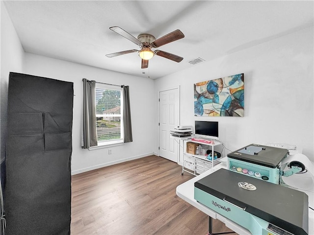 1205 Brentwood Dr, Corpus Christi, TX 78404 - office with a ceiling fan and wood finished floors