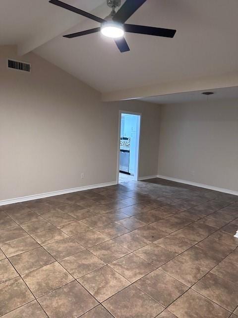 4633 Wilma Dr, Corpus Christi, TX 78412 - unfurnished room with a ceiling fan, baseboards, and dark tile patterned flooring