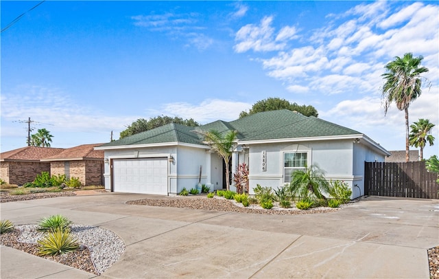 single story home with a garage