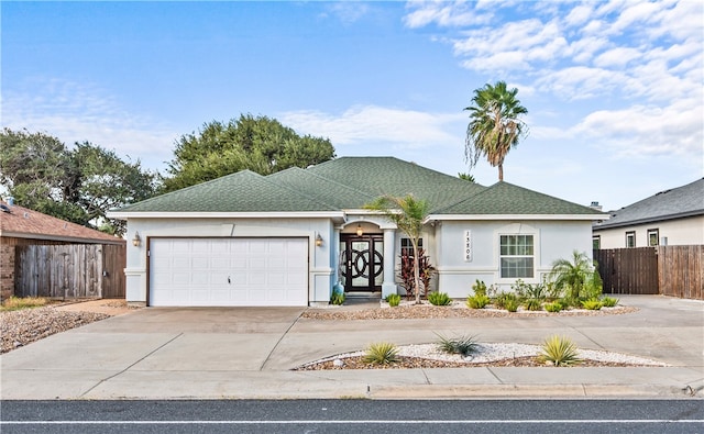 single story home featuring a garage