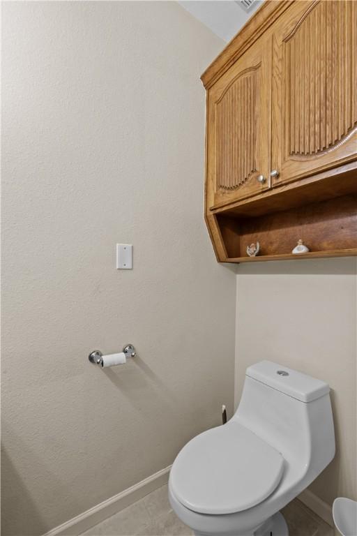 laundry room featuring cabinets and washer and dryer