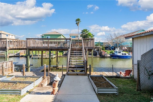 dock area featuring a water view