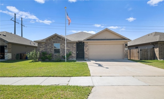 ranch-style home featuring a front lawn and a garage