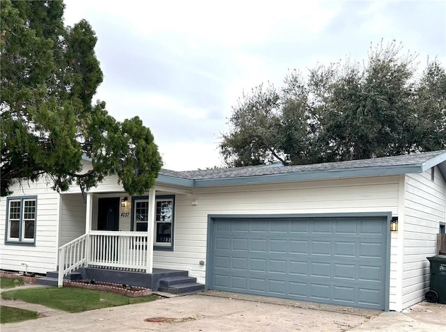 ranch-style house with driveway, a porch, and an attached garage