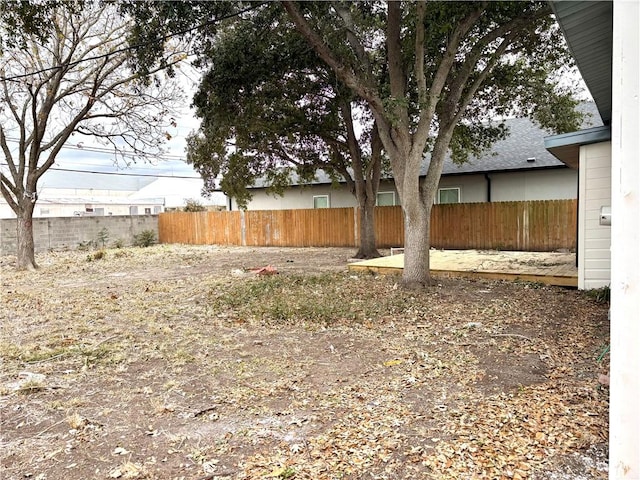 view of yard with fence