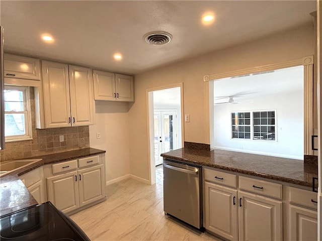 kitchen with recessed lighting, a sink, visible vents, backsplash, and dishwasher