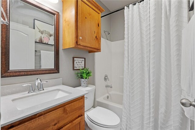 3013 Neches Dr, Corpus Christi, TX 78414 - bathroom with toilet, vanity, and shower / bath combo