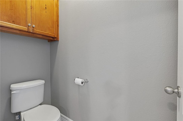 3013 Neches Dr, Corpus Christi, TX 78414 - bathroom with toilet and baseboards