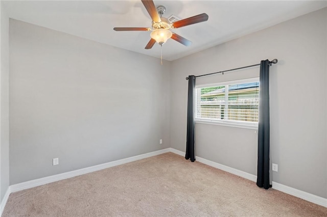 3013 Neches Dr, Corpus Christi, TX 78414 - empty room with light carpet, ceiling fan, and baseboards