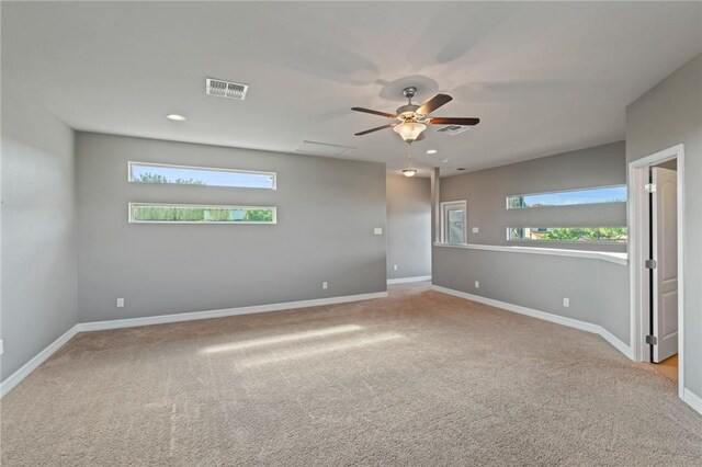 3013 Neches Dr, Corpus Christi, TX 78414 - carpeted spare room featuring a ceiling fan, plenty of natural light, and baseboards