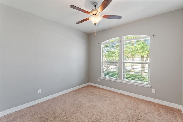 3013 Neches Dr, Corpus Christi, TX 78414 - empty room with carpet floors, baseboards, and a ceiling fan