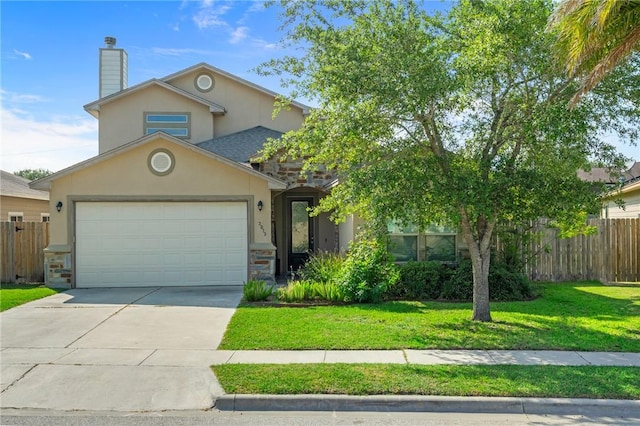 3013 Neches Dr, Corpus Christi, TX 78414 - traditional home featuring a garage, stucco siding, concrete driveway, and a chimney