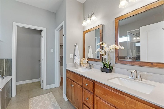 3013 Neches Dr, Corpus Christi, TX 78414 - full bathroom with double vanity, a relaxing tiled tub, and tile patterned flooring