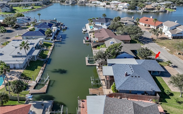 bird's eye view with a water view