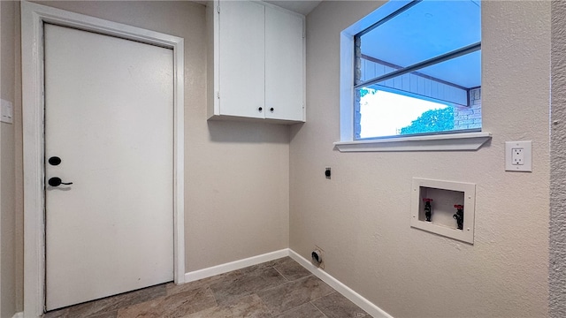 laundry room featuring cabinets, electric dryer hookup, and washer hookup