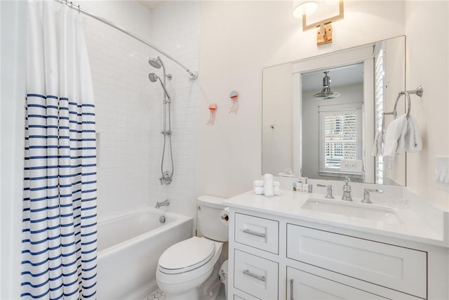 full bathroom featuring vanity, toilet, and shower / tub combo with curtain