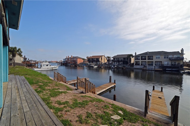 dock area with a water view