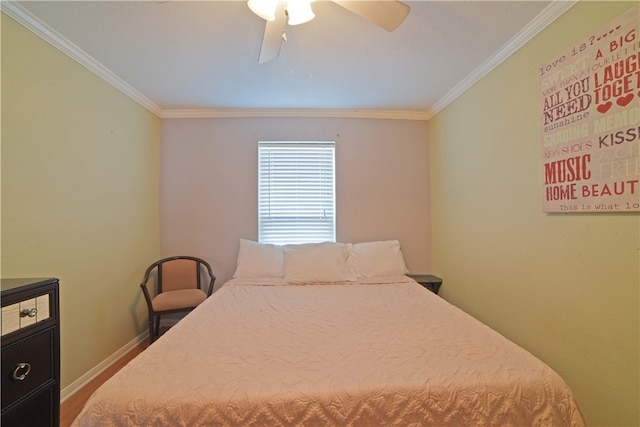 bedroom featuring ornamental molding, hardwood / wood-style floors, and ceiling fan