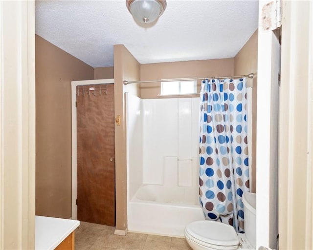 2407 David St, Corpus Christi, TX 78405 - full bath featuring shower / bath combo with shower curtain, a textured ceiling, tile patterned floors, and vanity