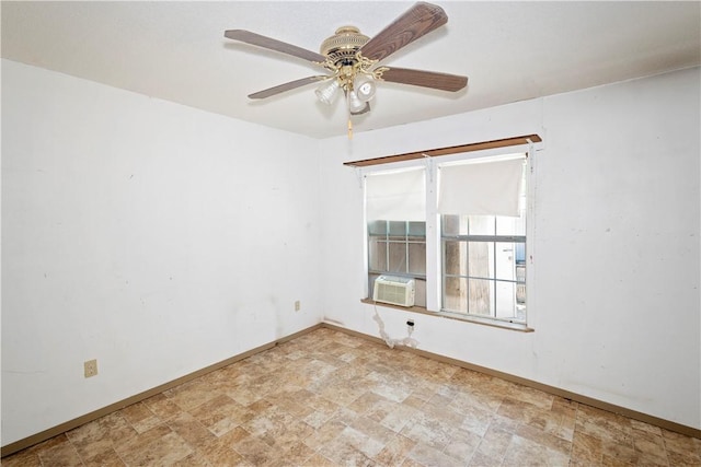 2407 David St, Corpus Christi, TX 78405 - spare room featuring cooling unit, stone finish flooring, and a ceiling fan