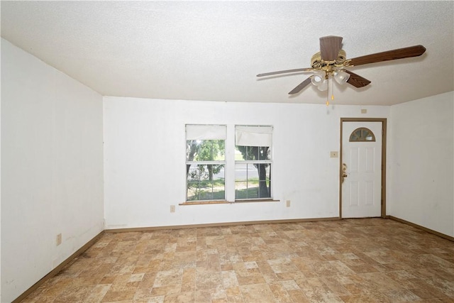 2407 David St, Corpus Christi, TX 78405 - spare room with stone finish floors and ceiling fan