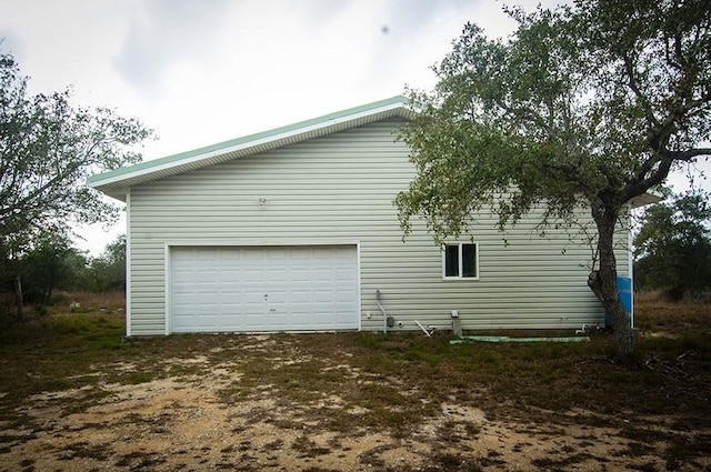 view of home's exterior with a garage