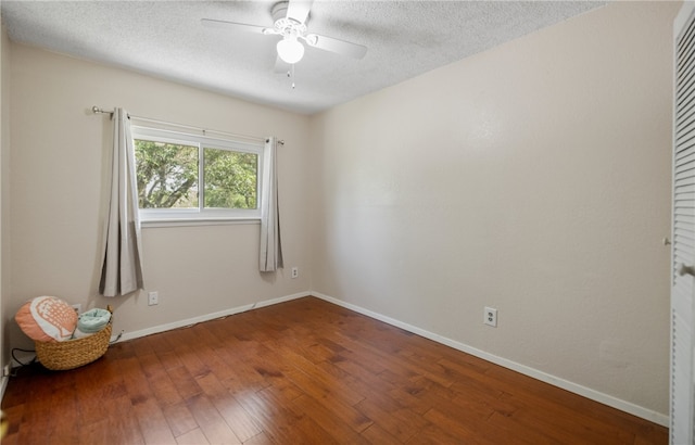 102 Mallard Dr, Aransas Pass, TX 78336 - empty room featuring hardwood / wood-style flooring, baseboards, a ceiling fan, and a textured ceiling