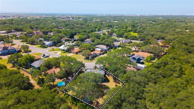 102 Mallard Dr, Aransas Pass, TX 78336 - aerial perspective of suburban area with property boundaries highlighted and a heavily wooded area